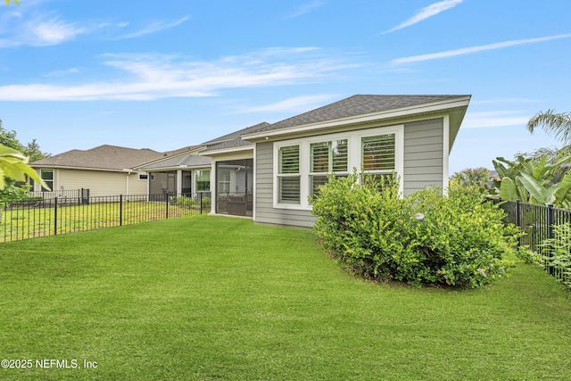 166 Spinner Dr, Ponte Vedra, FL 32081 - rear view of house with a sunroom and a shingled roof