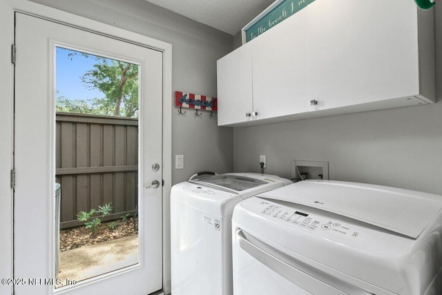 1773 Mariners Walk, Fernandina Beach, FL 32034 - laundry area featuring cabinet space and washer and clothes dryer
