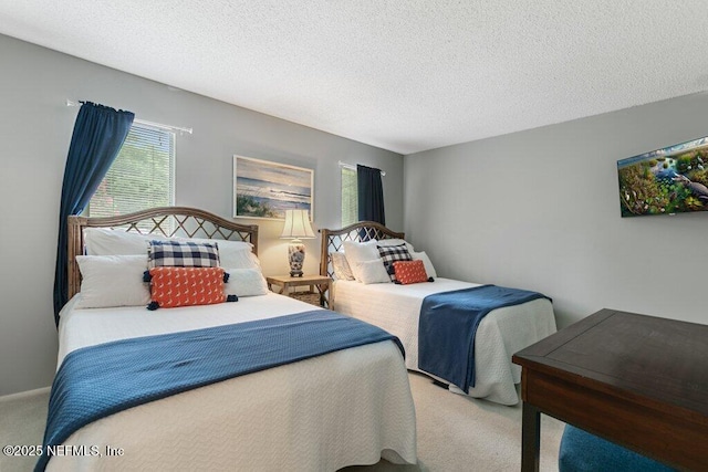 1773 Mariners Walk, Fernandina Beach, FL 32034 - bedroom with carpet floors and a textured ceiling