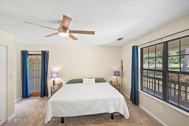 4310 Chokeberry Rd, Middleburg, FL 32068 - carpeted bedroom featuring a textured ceiling, ceiling fan, and baseboards