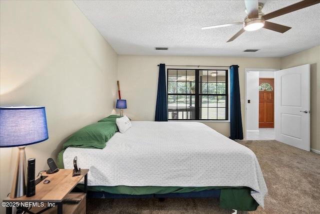 4310 Chokeberry Rd, Middleburg, FL 32068 - bedroom featuring carpet flooring, a ceiling fan, and a textured ceiling