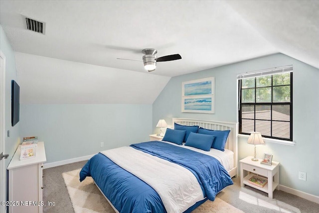 4310 Chokeberry Rd, Middleburg, FL 32068 - carpeted bedroom with vaulted ceiling, baseboards, and a ceiling fan