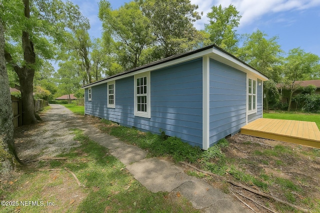 1109 Lake Shore Blvd, Jacksonville, FL 32205 - view of home's exterior featuring a deck and fence
