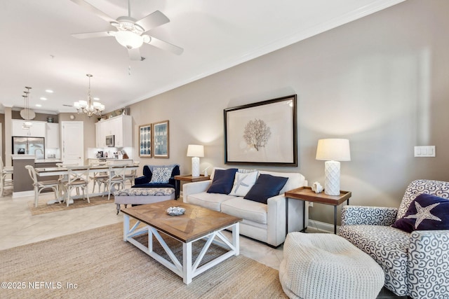 95282 Summerwoods Cir Unit 608, Fernandina Beach, FL 32034 - living area featuring a chandelier, ceiling fan, light tile patterned floors, ornamental molding, and recessed lighting