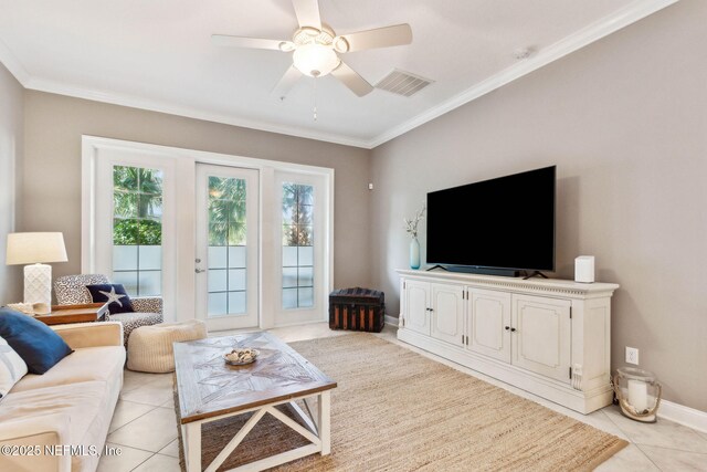 95282 Summerwoods Cir Unit 608, Fernandina Beach, FL 32034 - living area featuring light tile patterned floors, ceiling fan, crown molding, and baseboards