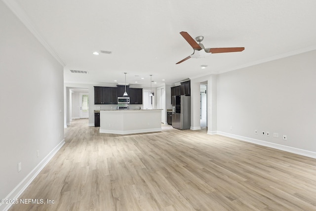 124 Medio Dr, Saint Augustine, FL 32095 - unfurnished living room with crown molding, a ceiling fan, light wood-type flooring, baseboards, and recessed lighting