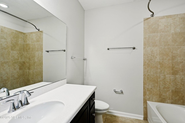 124 Medio Dr, Saint Augustine, FL 32095 - full bathroom featuring tile patterned flooring, vanity, toilet, shower / bathtub combination, and baseboards