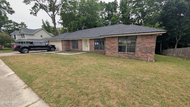 12576 Dunraven Trl, Jacksonville, FL 32223 - single story home featuring a garage, driveway, brick siding, and a shingled roof