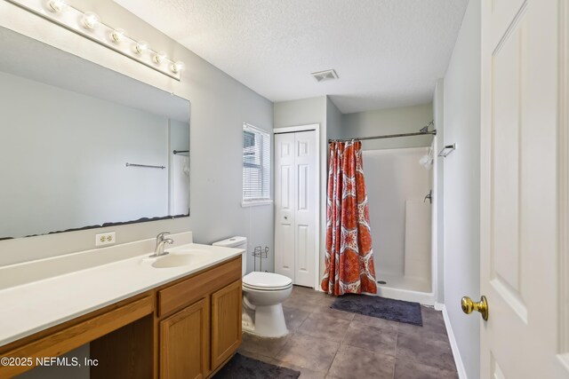 76466 Long Leaf Loop, Yulee, FL 32097 - full bath featuring toilet, vanity, a textured ceiling, and a shower with shower curtain