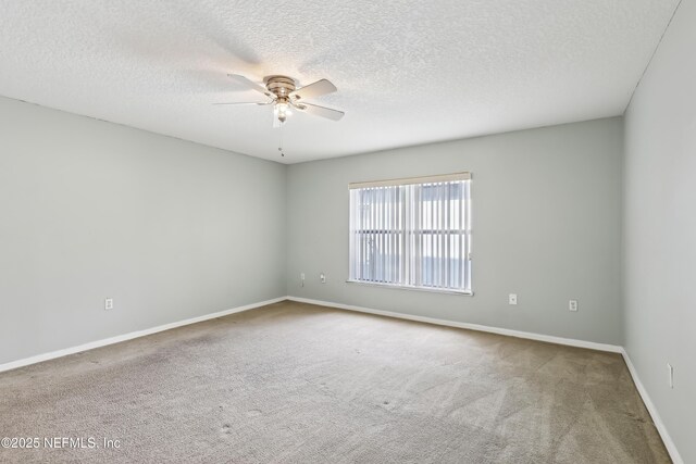 76466 Long Leaf Loop, Yulee, FL 32097 - carpeted empty room with a ceiling fan, a textured ceiling, and baseboards