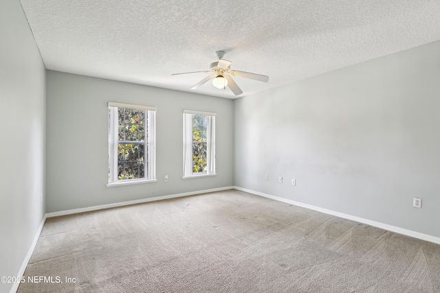 76466 Long Leaf Loop, Yulee, FL 32097 - carpeted spare room featuring a ceiling fan, baseboards, and a textured ceiling