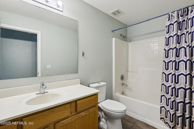 76466 Long Leaf Loop, Yulee, FL 32097 - bathroom with toilet, vanity, shower / bathtub combination with curtain, tile patterned flooring, and a textured ceiling