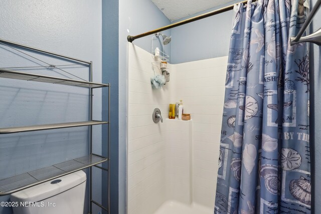 76466 Long Leaf Loop, Yulee, FL 32097 - bathroom featuring a stall shower and toilet