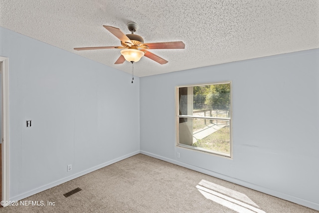 112 Sculpin Dr, Florahome, FL 32140 - carpeted spare room with a textured ceiling, a ceiling fan, and baseboards