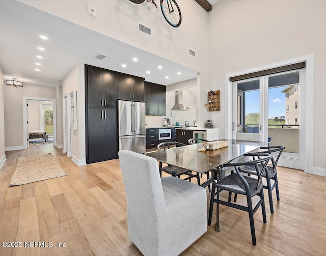 822 Spinnakers Reach Dr, Ponte Vedra Beach, FL 32082 - dining room with light wood-style floors, baseboards, wine cooler, and recessed lighting