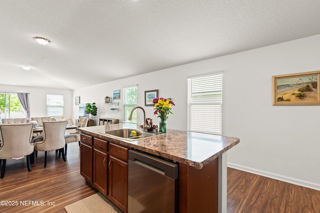 2840 Buck Creek Pl, Green Cove Springs, FL 32043 - kitchen featuring dishwasher, a sink, dark wood finished floors, open floor plan, and a kitchen island with sink