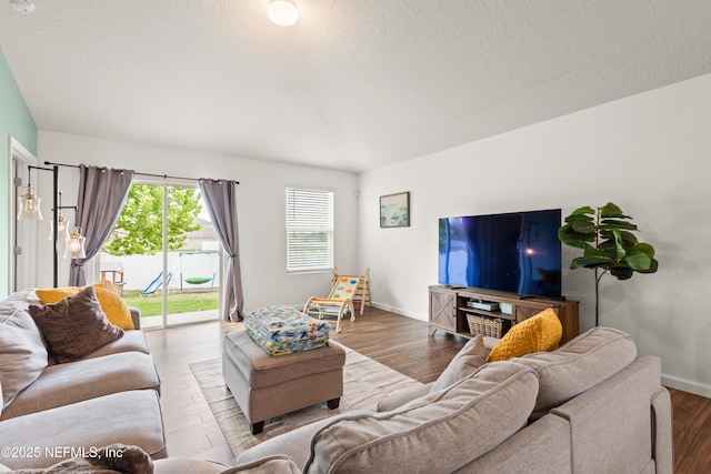 2840 Buck Creek Pl, Green Cove Springs, FL 32043 - living room featuring wood finished floors and baseboards