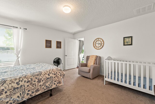 2840 Buck Creek Pl, Green Cove Springs, FL 32043 - carpeted bedroom featuring a textured ceiling