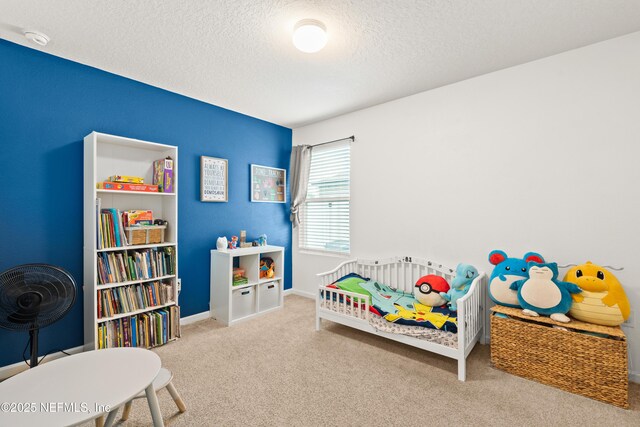 2840 Buck Creek Pl, Green Cove Springs, FL 32043 - bedroom featuring a textured ceiling, carpet floors, and baseboards