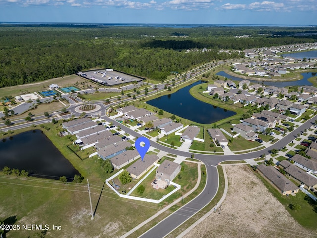 2840 Buck Creek Pl, Green Cove Springs, FL 32043 - aerial view of property and surrounding area with a heavily wooded area, a large body of water, and nearby suburban area