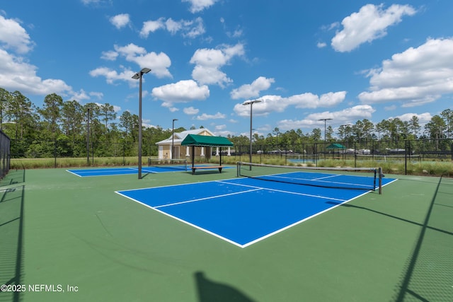 2840 Buck Creek Pl, Green Cove Springs, FL 32043 - view of tennis court with fence and community basketball court