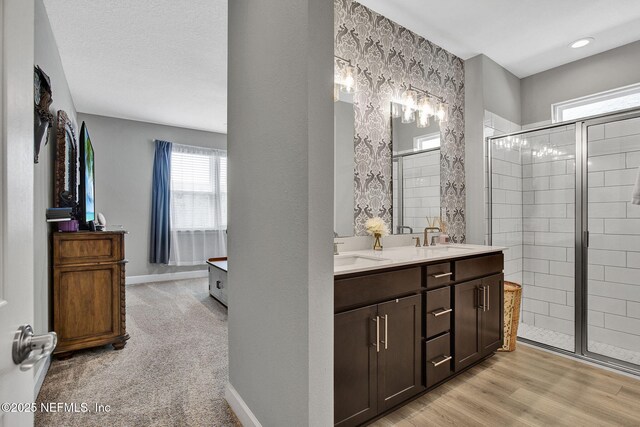 267 Honeycomb Trl, Saint Augustine, FL 32095 - bathroom with a shower stall and double vanity