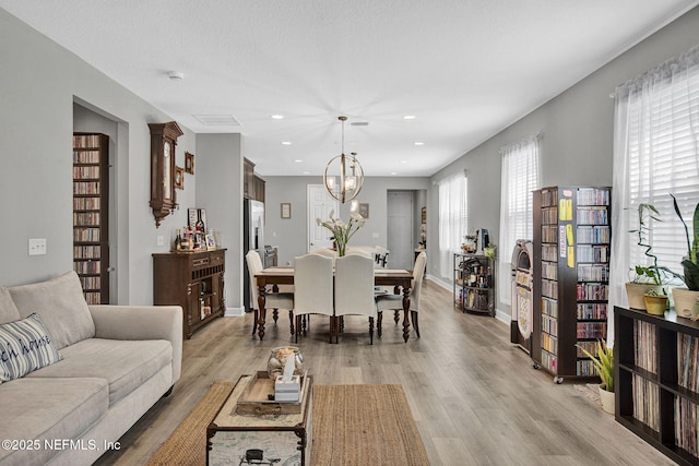 267 Honeycomb Trl, Saint Augustine, FL 32095 - living area with a chandelier, light wood-type flooring, recessed lighting, and baseboards