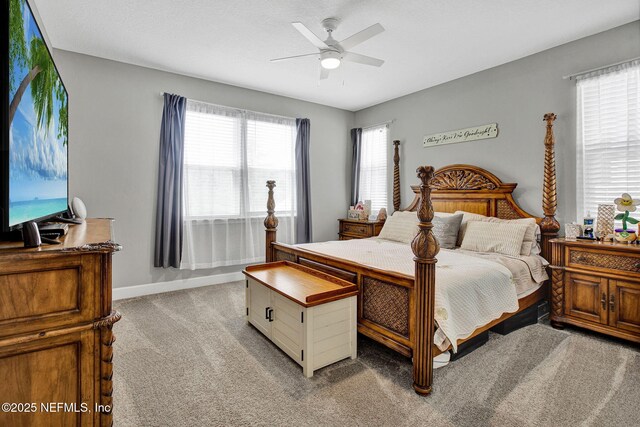 267 Honeycomb Trl, Saint Augustine, FL 32095 - bedroom featuring light carpet, ceiling fan, baseboards, and a desk