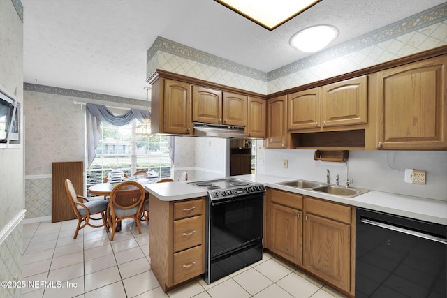 359 Carson Dr, Orange Park, FL 32073 - kitchen featuring wallpapered walls, black appliances, a textured ceiling, a sink, and exhaust hood