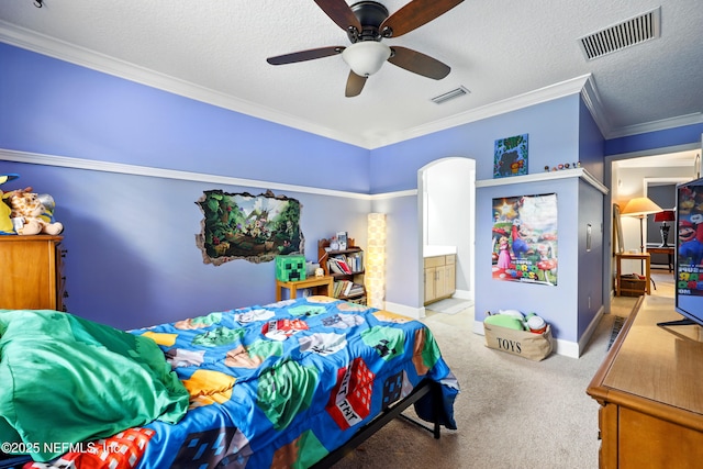 85053 Sagaponack Dr, Fernandina Beach, FL 32034 - bedroom featuring carpet floors, baseboards, ornamental molding, a ceiling fan, and ensuite bath