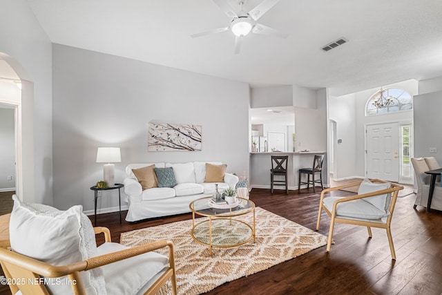 1491 Cedar Grove Ter, Fleming Island, FL 32003 - living room featuring arched walkways, ceiling fan, wood finished floors, and baseboards