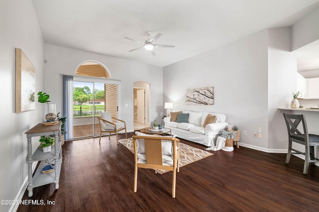 1491 Cedar Grove Ter, Fleming Island, FL 32003 - living area with a ceiling fan, arched walkways, wood finished floors, and baseboards