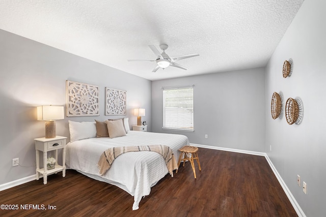 1491 Cedar Grove Ter, Fleming Island, FL 32003 - bedroom with wood finished floors, baseboards, a textured ceiling, and a ceiling fan