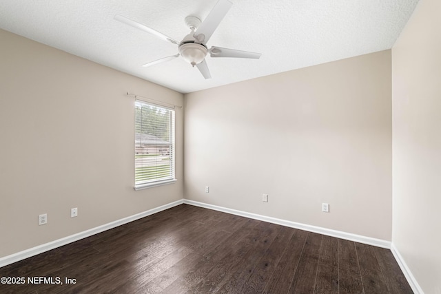 1491 Cedar Grove Ter, Fleming Island, FL 32003 - empty room with dark wood-type flooring, a ceiling fan, and baseboards