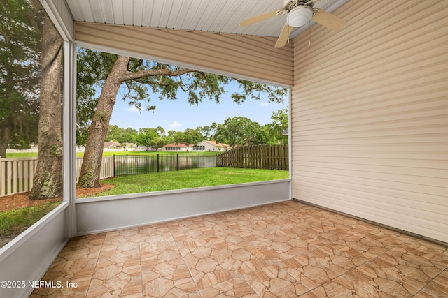 1491 Cedar Grove Ter, Fleming Island, FL 32003 - unfurnished sunroom with a ceiling fan, a water view, and vaulted ceiling