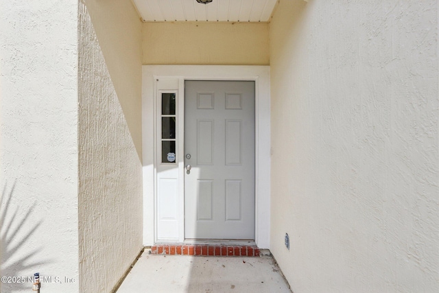 2454 Woodstork Ct, Saint Augustine, FL 32092 - property entrance featuring stucco siding
