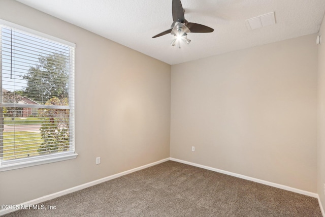 2454 Woodstork Ct, Saint Augustine, FL 32092 - unfurnished room with carpet flooring, a ceiling fan, and baseboards
