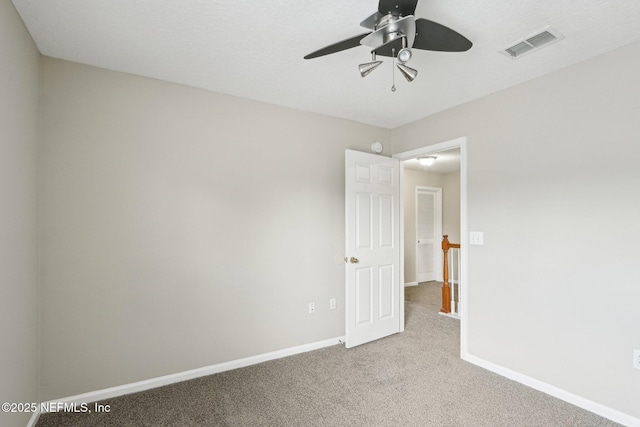2454 Woodstork Ct, Saint Augustine, FL 32092 - carpeted empty room with ceiling fan and baseboards