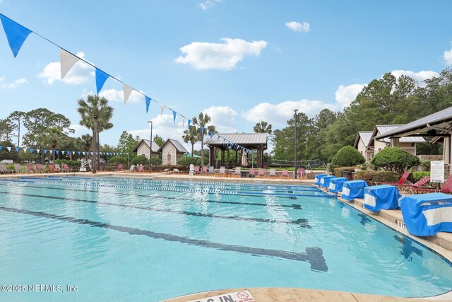 2454 Woodstork Ct, Saint Augustine, FL 32092 - community pool featuring a gazebo