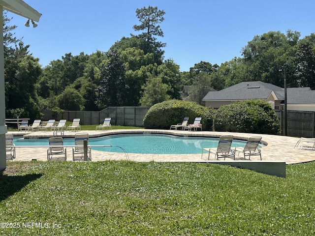 community pool with a patio