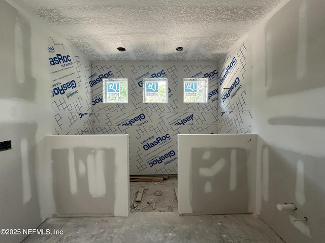 809 Brandywine Ct, Saint Augustine, FL 32086 - bathroom featuring a textured ceiling