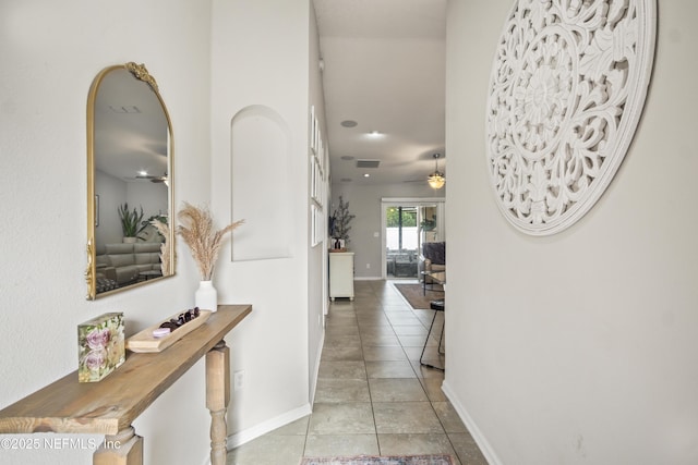 15831 Baxter Creek Dr, Jacksonville, FL 32218 - hall with light tile patterned floors, baseboards, and recessed lighting
