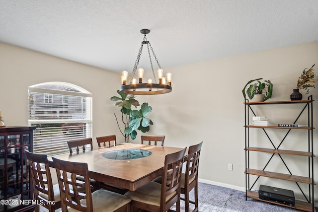 15831 Baxter Creek Dr, Jacksonville, FL 32218 - carpeted dining space featuring a chandelier and baseboards