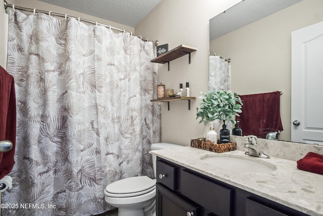 15831 Baxter Creek Dr, Jacksonville, FL 32218 - full bath with toilet, vanity, and a textured ceiling