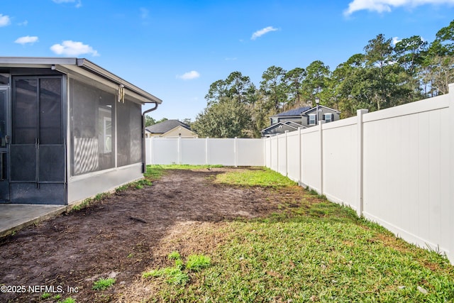 15831 Baxter Creek Dr, Jacksonville, FL 32218 - fenced backyard featuring a sunroom