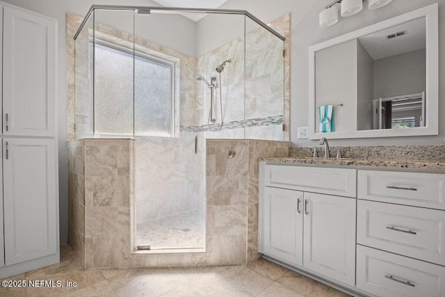 1211 Spring Branch Rd, Saint Johns, FL 32259 - bathroom with a shower stall, vanity, and tile patterned floors