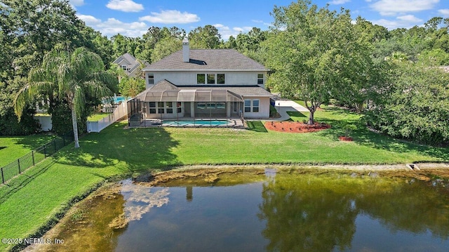 1211 Spring Branch Rd, Saint Johns, FL 32259 - rear view of house with a water view, stucco siding, and a chimney