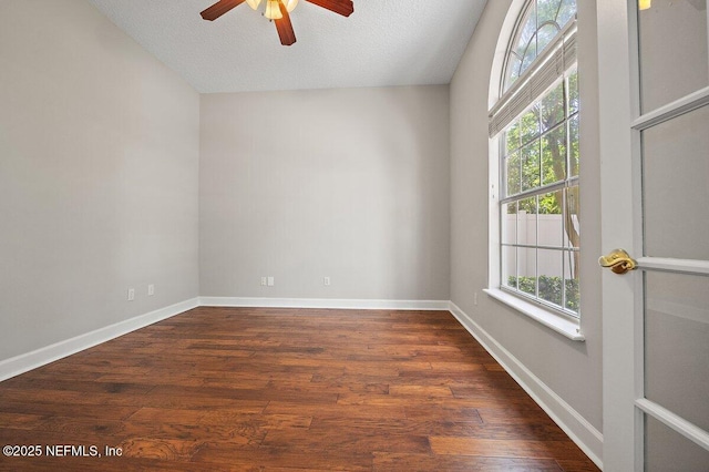 1211 Spring Branch Rd, Saint Johns, FL 32259 - unfurnished room featuring a ceiling fan, healthy amount of natural light, dark wood-type flooring, a textured ceiling, and baseboards