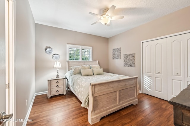 3461 Mainard Branch Ct, Fleming Island, FL 32003 - bedroom with dark wood finished floors, a closet, a ceiling fan, and baseboards