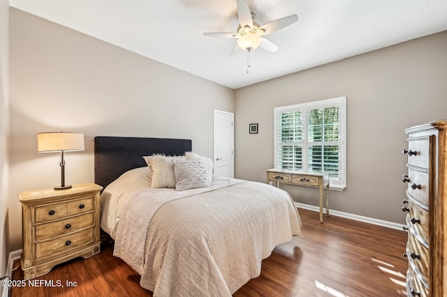 3461 Mainard Branch Ct, Fleming Island, FL 32003 - bedroom featuring dark wood finished floors, baseboards, and a ceiling fan